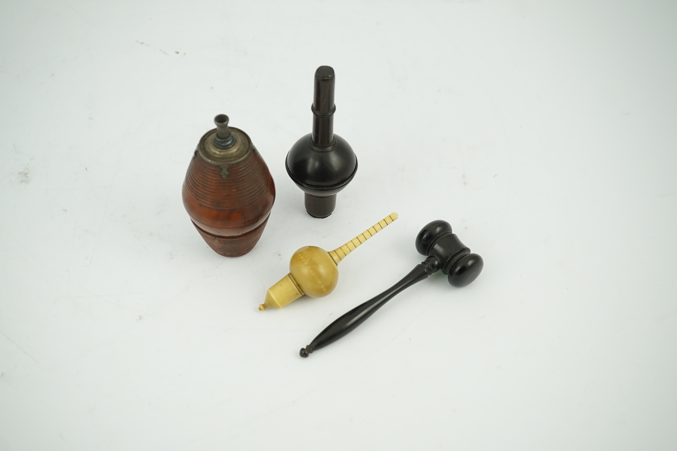 A 19th century coquilla nut powder flask, a hardwood cased ivorine hydrometer and a small ebony gavel, gavel 11cm long. Condition - good